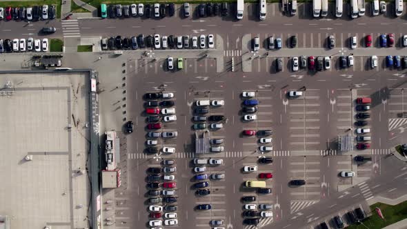 Aerial Drone View Top Down View of Supermarket Parking Lot with a Lots of Cars alt
