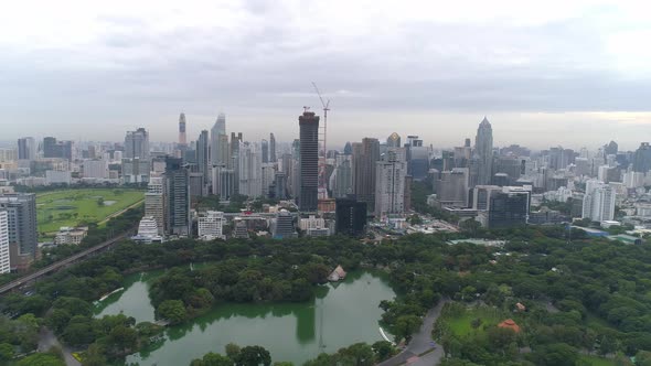 4k Aerial city view of Bangkok dowtnown, Flying over Bangkok, Thailand. alt