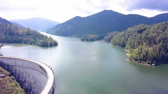 Arcing shot over a large dam project in Romania. alt