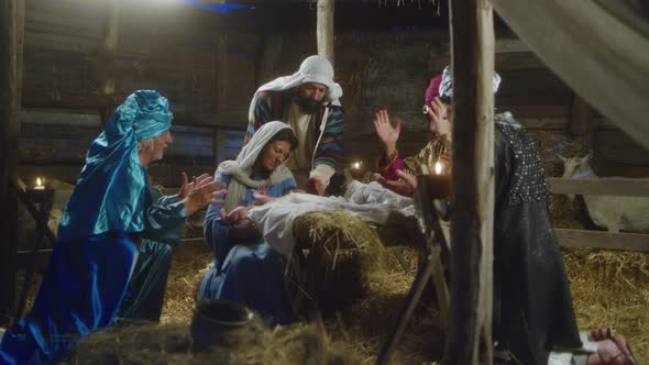 Magi and Parents Gathering Around Baby Jesus Nativity alt