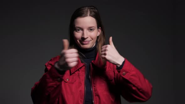 Girl Showing Thumbs Up