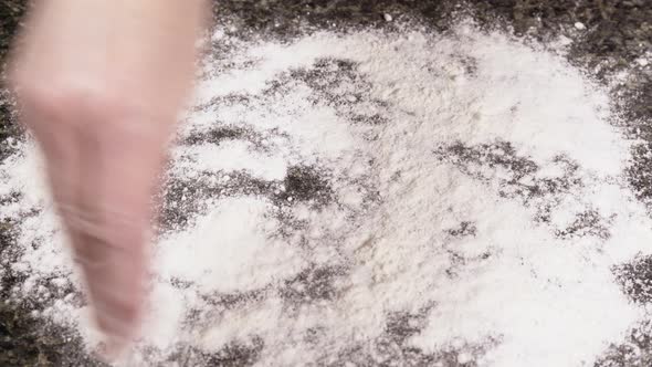 flour and pie crust dough placed on countertop alt