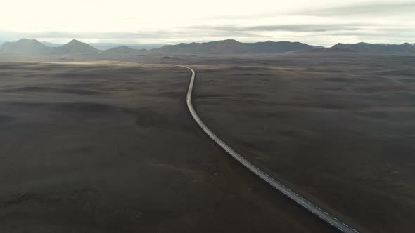 Cinematic Aerial View Of Vehicle Driving Road