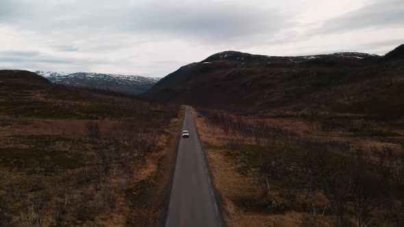 Road trip in scenic Northern Norway; drone view of remote landscape alt