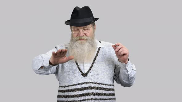 Old Aged Man Touching Big Invisible Virtual Screen for Copyspace alt