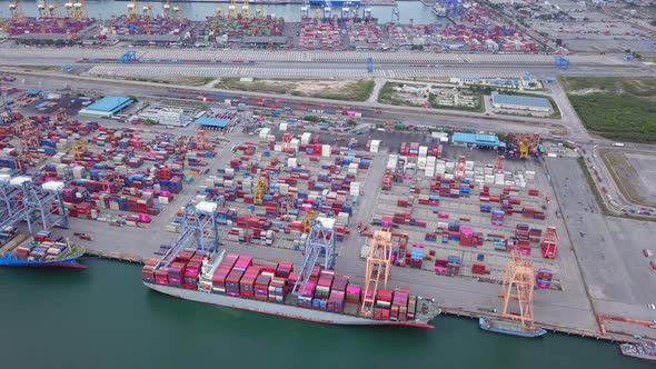 Aerial top view of container logistics shipping in Laem Chabang, Chon Buri, Thailand alt