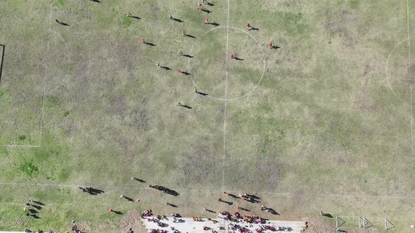 Drone Flying Over Soccer Match Shot with Top Down View