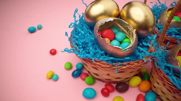 Easter Egg with Colorful Candies in a Basket Close Up