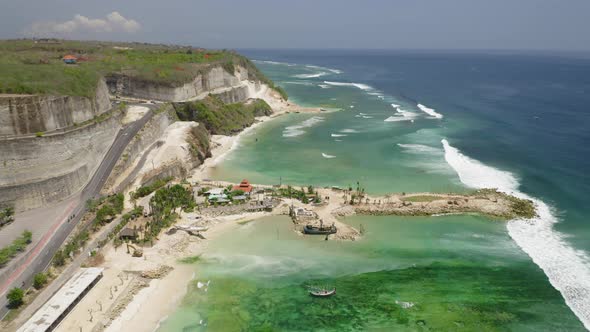 Aerial Drone Flight Over Land Tonge at Melasti Beach Bali Indonesia alt