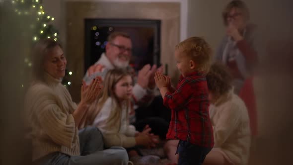 A Happy Family an Elderly Couple Their Daughter and Little Grandson and a Dog Have Fun By the alt