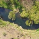 Aerial view of Mendry river in the middle of the woods. - VideoHive Item for Sale