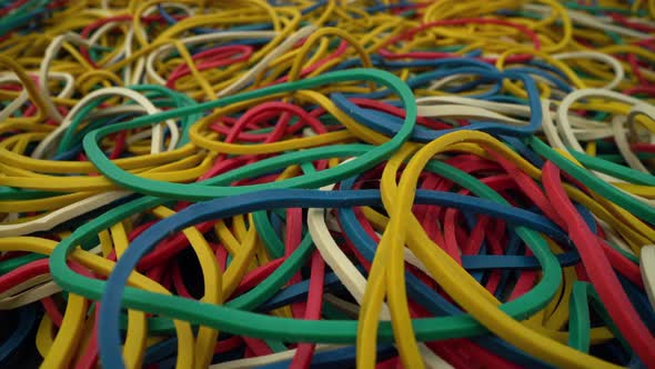 Closeup Colorful Ring Shaped Rubber Bands Background alt
