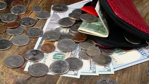 Open Wallet with Us Coins American Dollars Banknotes and Red Heart Rotate Slowly alt