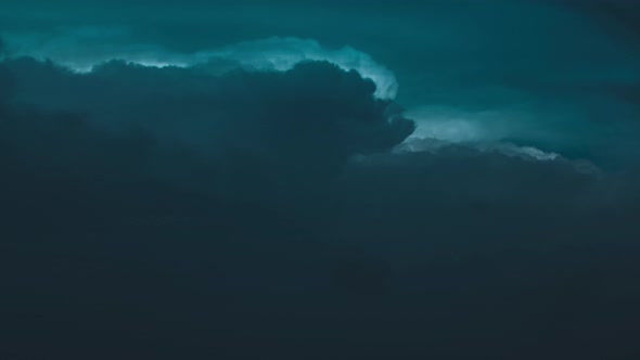 Timelapse of movement of dark blue night heavy clouds 4k footage