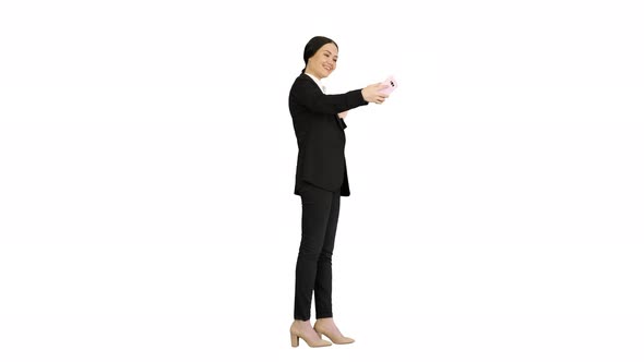 Smiling Businesswoman Taking Selfie on Her Phone on White Background alt