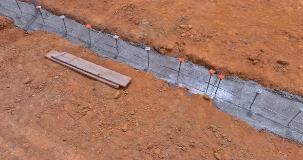 Providing Reinforcement to a Reinforced Concrete Structure Through a Strip Foundation Frame alt