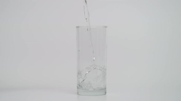 Super Slow Motion of Pouring Water in Transparent Glass Shot at 1000 Fps alt