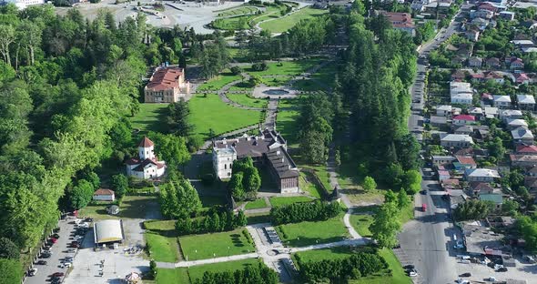 Zugdidi, Georgia - May 30 2022: Aerial view of Dadiani Palace in the center of Zugdidi city alt