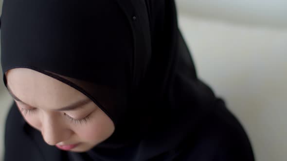 Headshot portrait of attractive teenage muslim female with beautiful smile 