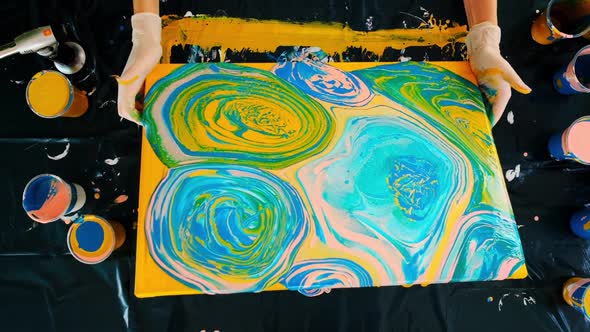 Female Artist Works on Abstract Fluid Art Painting