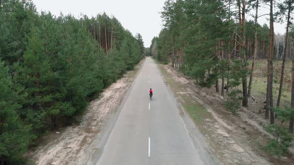 Sport. Cycling. Cardio workout exercising on bicycle. Pedaling on bike. alt