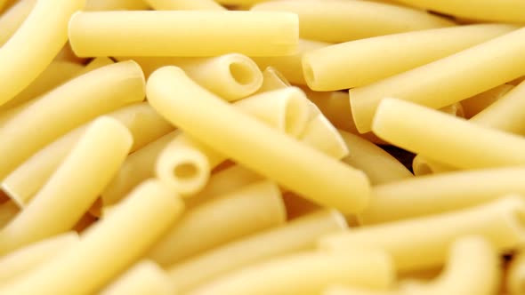 Close-up of sedanini rigati pasta alt