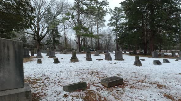 Drone Fly through Old Cemetery and tree in winter snow near Murfreesboro Tennessee alt