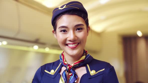 Cabin Crew or Air Hostess Working in Airplane alt