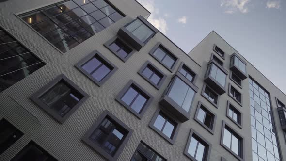 Modern residential complex with an unusual design, dolly camera shot alt