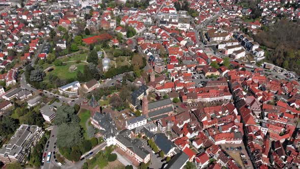Beautiful flight over the fortress and park in the center of Weinheim. Germany alt