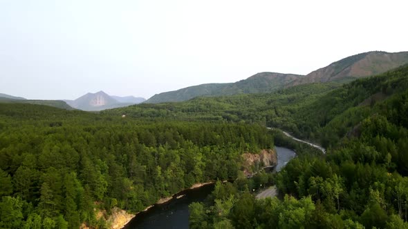 forest with river and volcano view