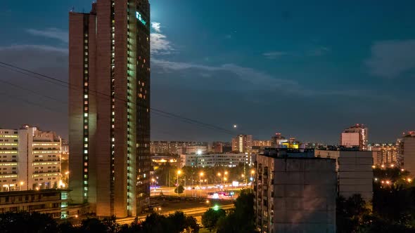 Night Urban View With Moon and Clouds Motion