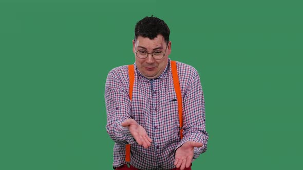 A Portrait of a Man Who Talks About Something Points at Something with His Hands Justifies Himself alt