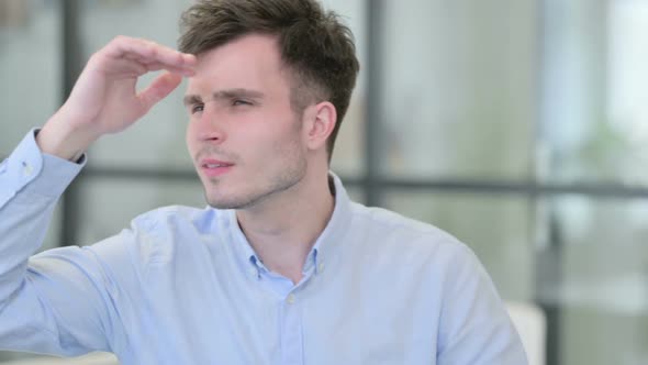 Young Man Looking Around Searching alt