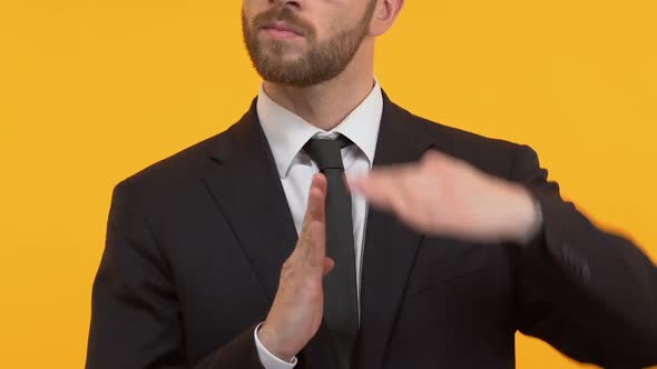 Tired Man Showing Time-Out Gesture, Asking for Weekend or Rest From Work alt