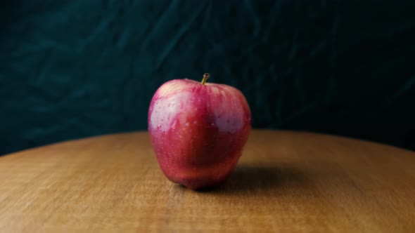 Rotating Red Apple on Black Background