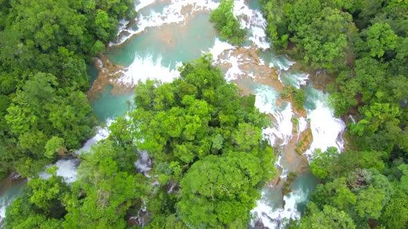Aerial footage viewing the Agua Azul Waterfalls from above