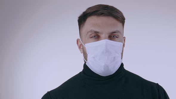 Close Up Man Wearing Protective Medical Mask