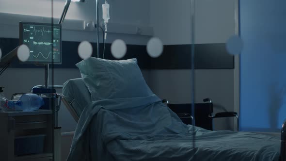 Hospital Ward with Empty Bed at Clinical Facility alt