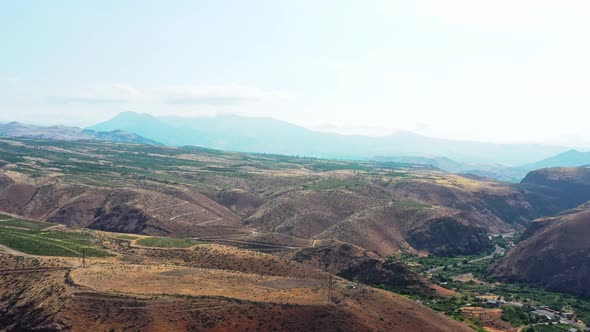 Aerial Drone Zoom in of Vast Mountains of Armenia alt