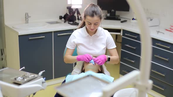 Portrait of a patient to the dentist for a check up and a dental cleaning alt