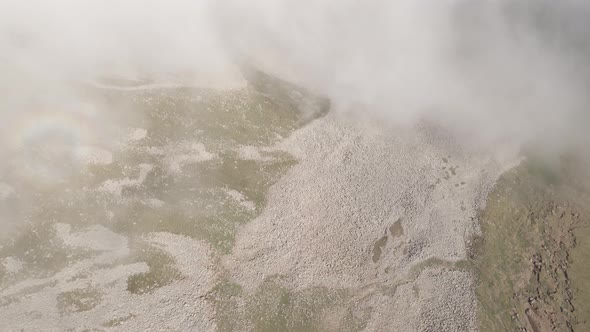 Scenic aerial view of moving white clouds at Abuli Mountain. Georgia alt