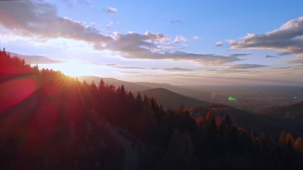 Epic sunset - cinematic aerial shoot of stunning beatuy sun rays in autumn beskid mountains