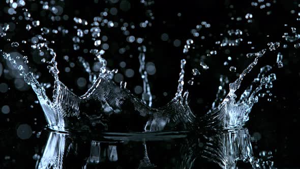 Super Slow Motion Shot of Water Crown Splash at 1000Fps Isolated on Black Background alt