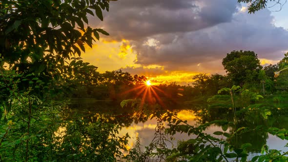 View of Colorful dramatic sky sunset or sunrise with Moving clouds background alt