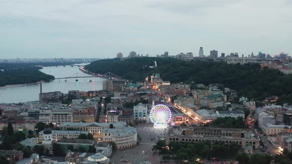 Kyiv City Downtown Aerial With Bridges In The Background And Ferris Wheel At The Center