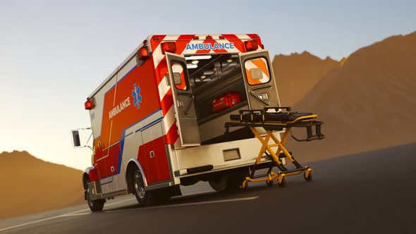 Wide-open ambulance truck ready for rescue. The vast landscape around parking. alt