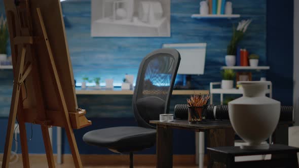 Nobody in Artistic Studio Filled with Artwork Equipment alt