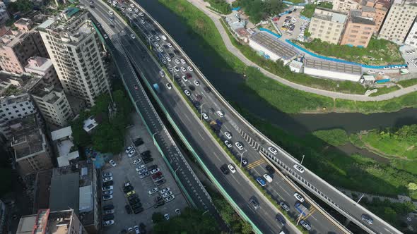 Aerial footage of Morning rush hour of traffic to enter the town in shenzhen city, China. Hypelapse alt