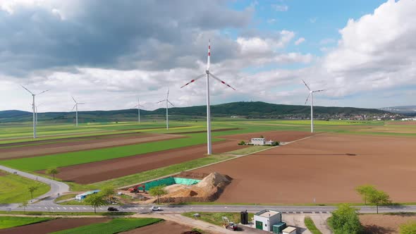 Aerial View of Wind Turbines Farm and Agricultural Fields. Austria. alt